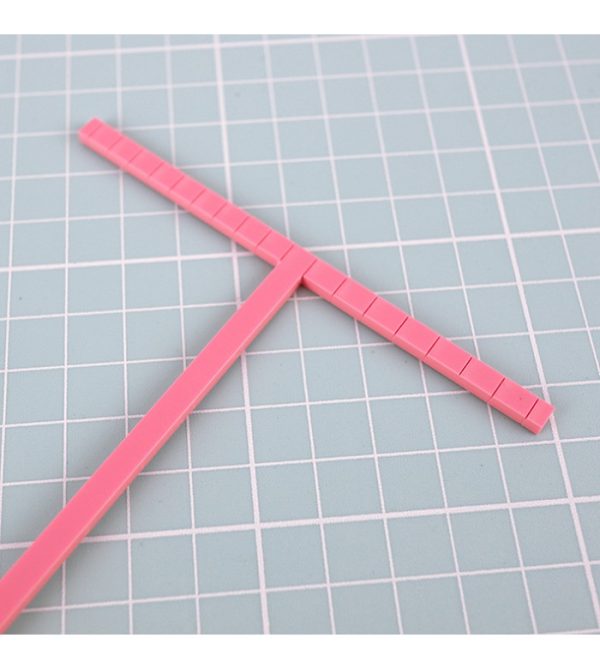herramienta encuadernar rosa